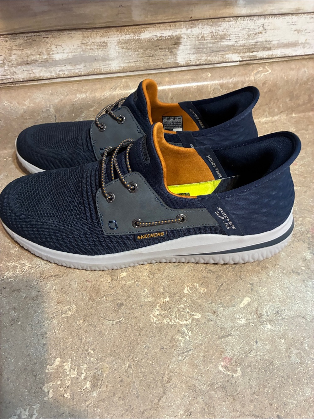 Skechers Men's Size 12 Navy Knit Slip-On Sneakers with Orange Liner - Picture 2 of 11